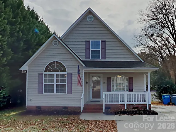 a front view of a house with a porch