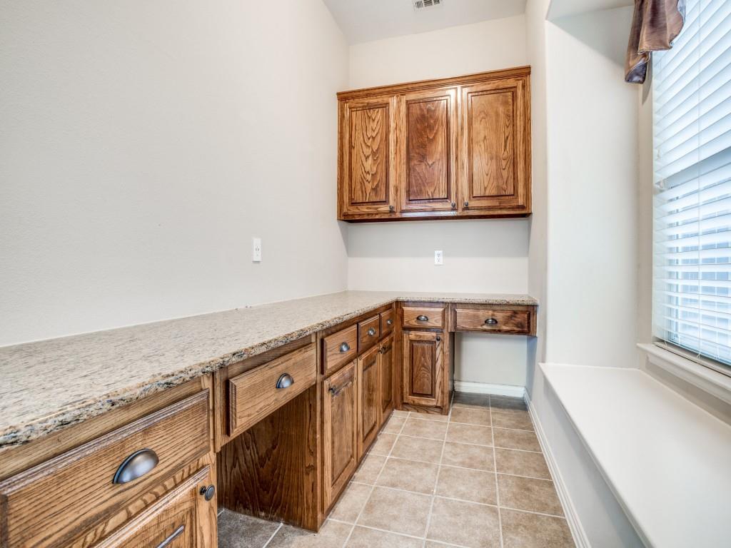2613 Sandstone Lane Midlothian, TX 76065 - Photo 17 of 36 a view of a kitchen with wooden floor and a sink