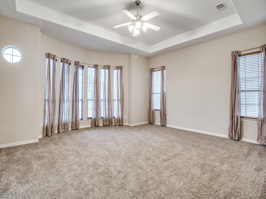 2613 Sandstone Lane Midlothian, TX 76065 - Photo 20 of 36 an empty room with windows and fan