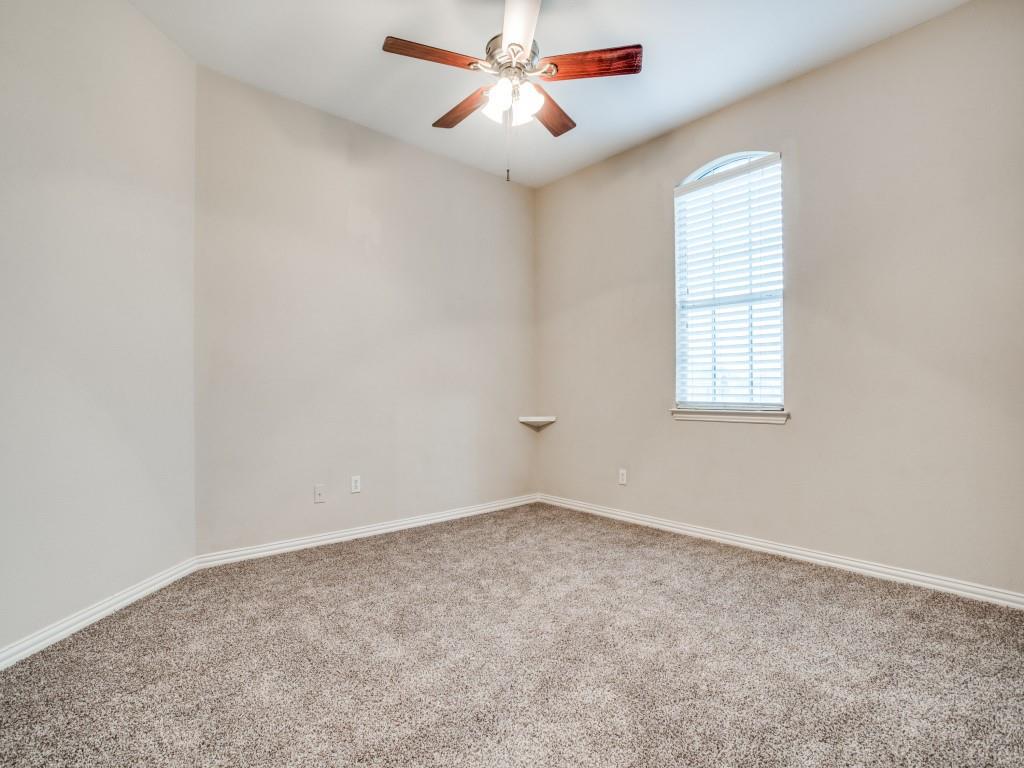 2613 Sandstone Lane Midlothian, TX 76065 - Photo 31 of 36 an empty room with windows and fan