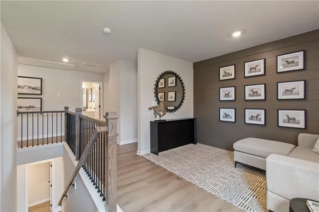 a bathroom with a double vanity sink mirror and shower
