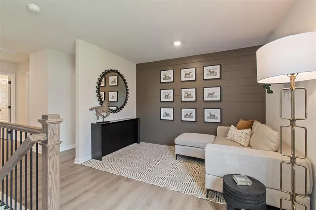 a bathroom with double sink and a mirror