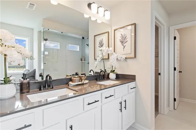 a kitchen with stainless steel appliances granite countertop a stove and a refrigerator