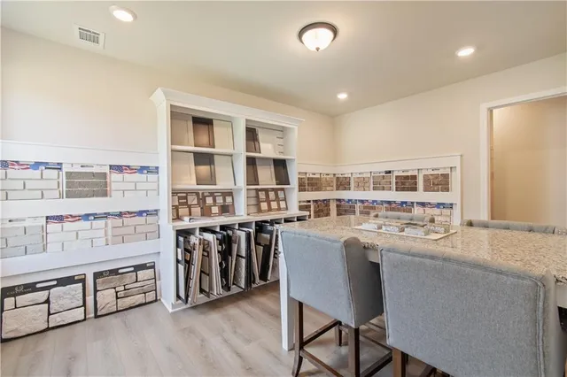 a kitchen with a sink stove and refrigerator