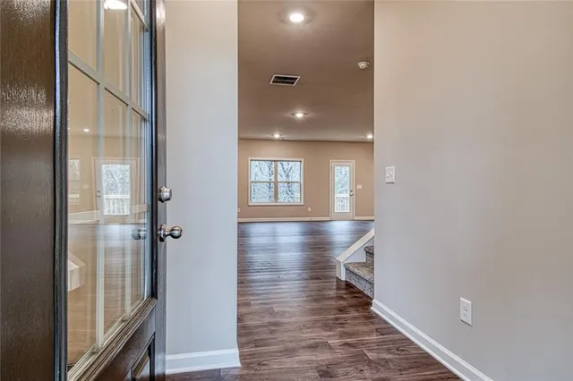 an empty room with windows