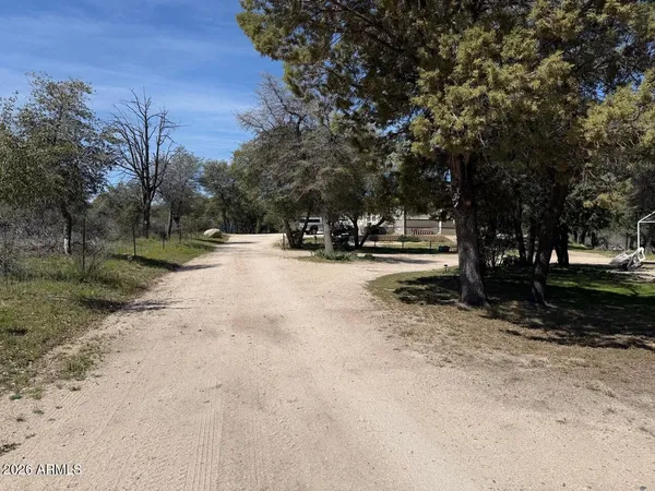 an aerial view of a house with mountain view
