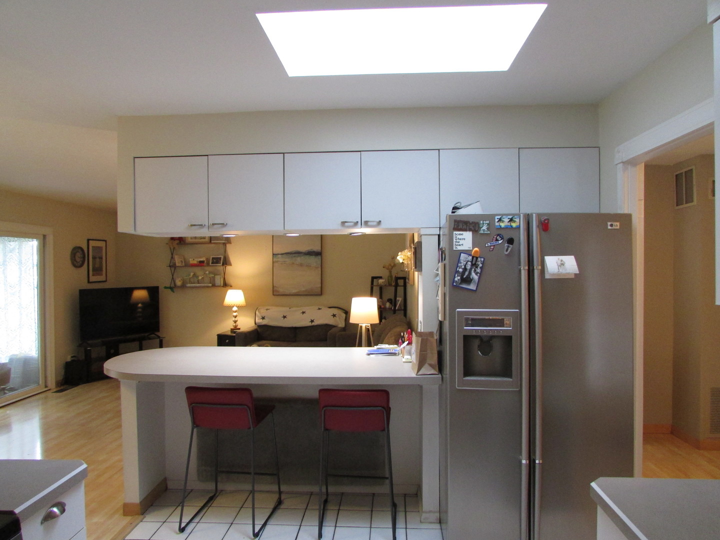 21W255 Canary Road Lombard, IL 60148 - Photo 13 of 32 a kitchen with a sink a refrigerator and cabinets