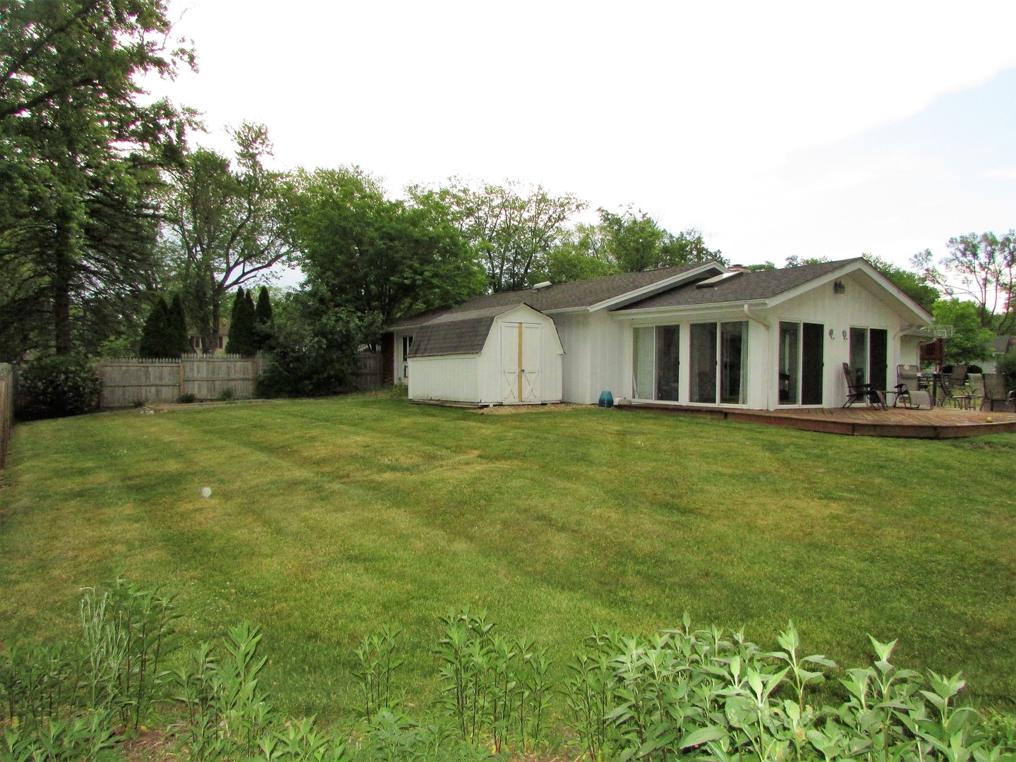 21W255 Canary Road Lombard, IL 60148 - Photo 31 of 32 a front view of house with yard and green space
