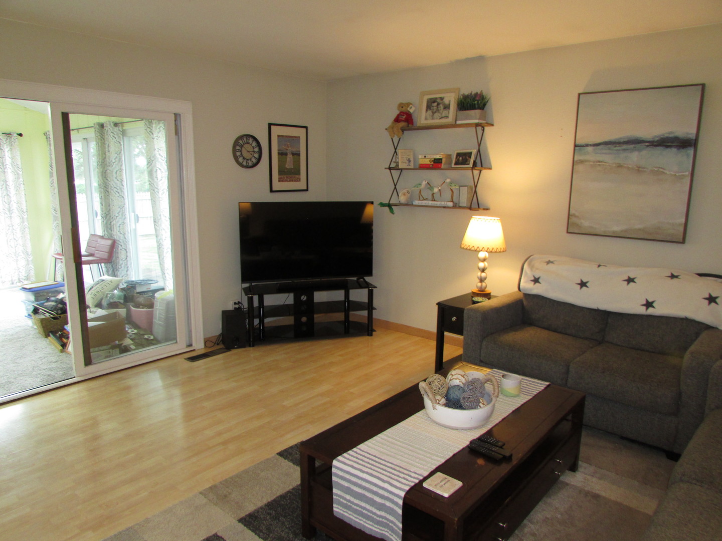 21W255 Canary Road Lombard, IL 60148 - Photo 7 of 32 a living room with furniture and a flat screen tv