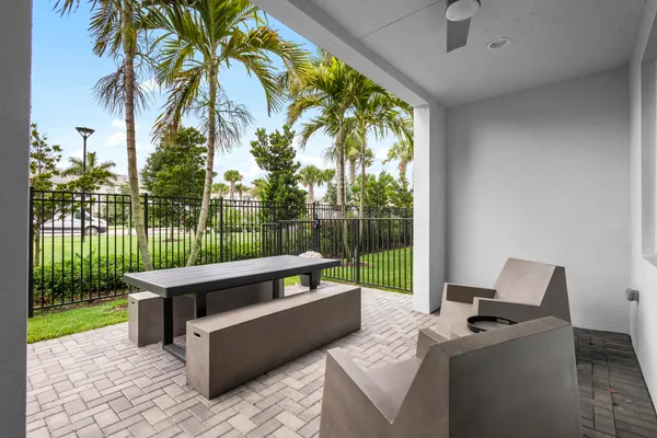 a building outdoor space with patio furniture