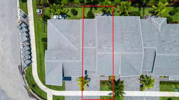 an aerial view of a highlighted house