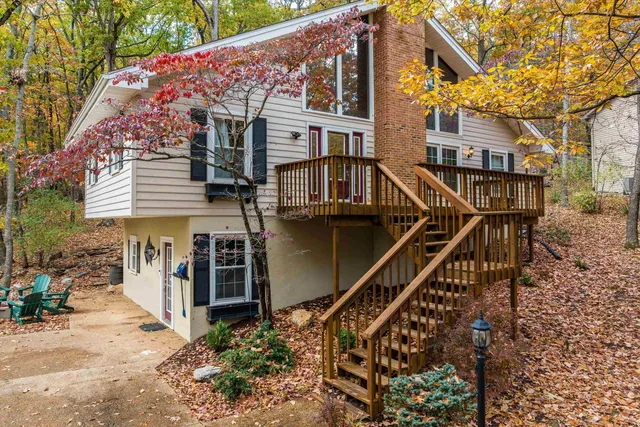 a view of house with outdoor seating