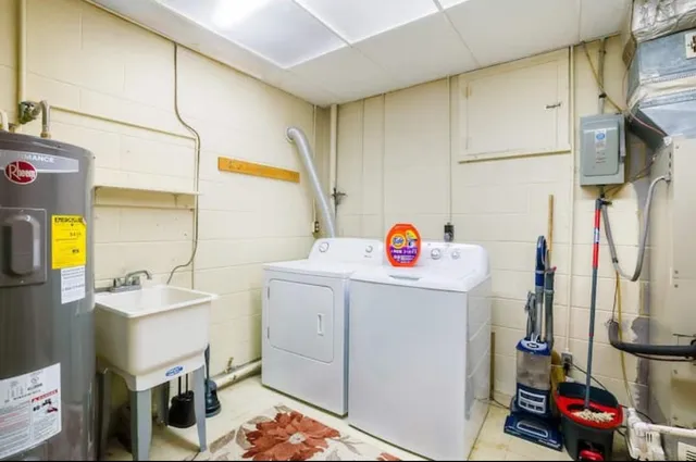 a backyard of a house with barbeque oven and outdoor seating