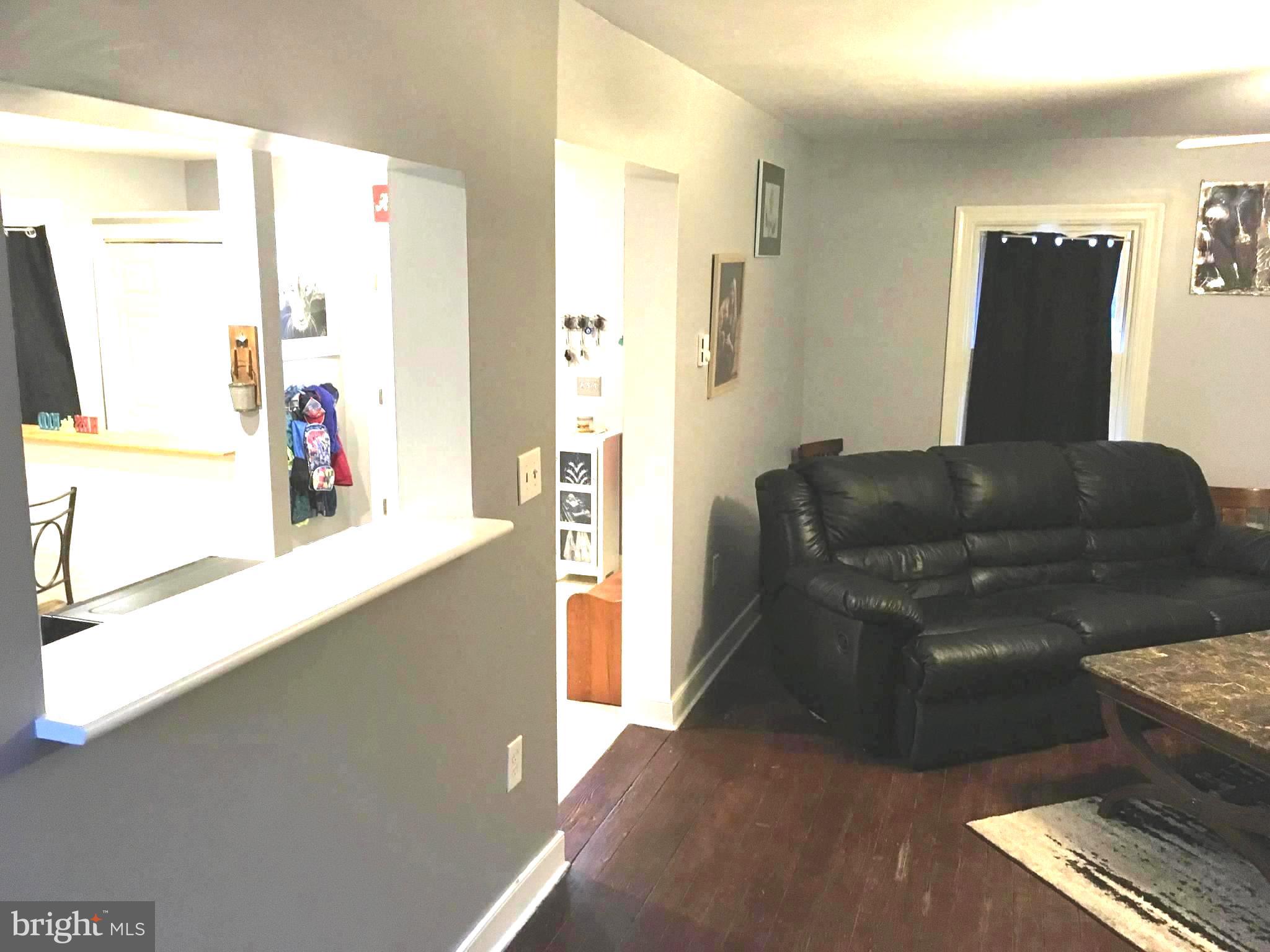 309 Broad Street Crumpton, MD 21628 - Photo 8 of 21 Living Room into Kitchen