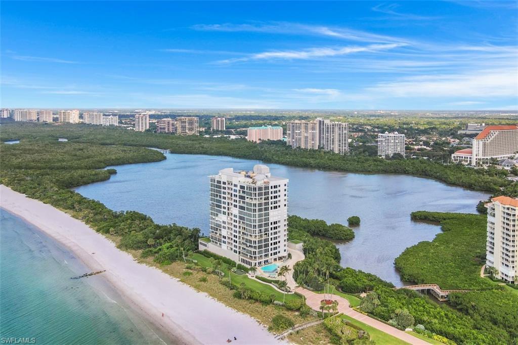 10 Seagate Drive, Unit 6S Naples, FL 34103 - Photo 25 of 34 a view of a lake with a city view