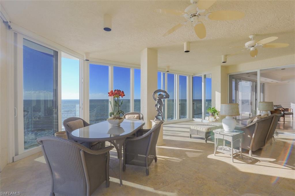 10 Seagate Drive, Unit 6S Naples, FL 34103 - Photo 7 of 34 a view of a dining room with furniture window and outside view