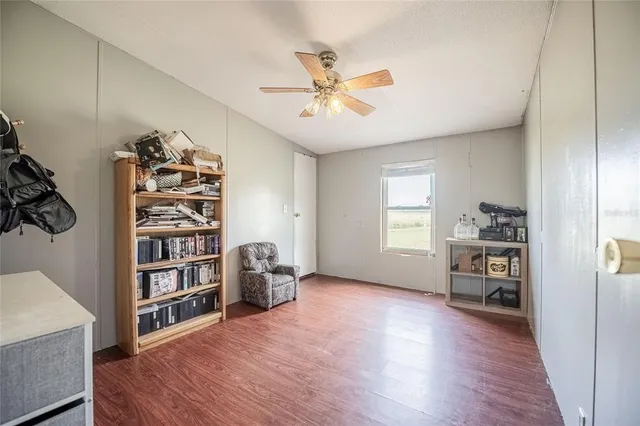 a en suite bathroom with a toilet sink and mirror