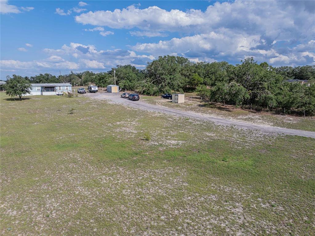 194 North Lake Patrick Road Babson Park, FL 33827 - Photo 25 of 31 a view of a field with a building in the background
