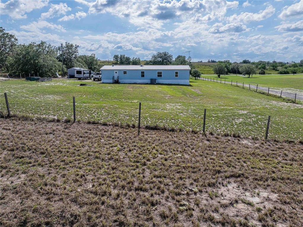 194 North Lake Patrick Road Babson Park, FL 33827 - Photo 30 of 31 an aerial view of a house with a yard