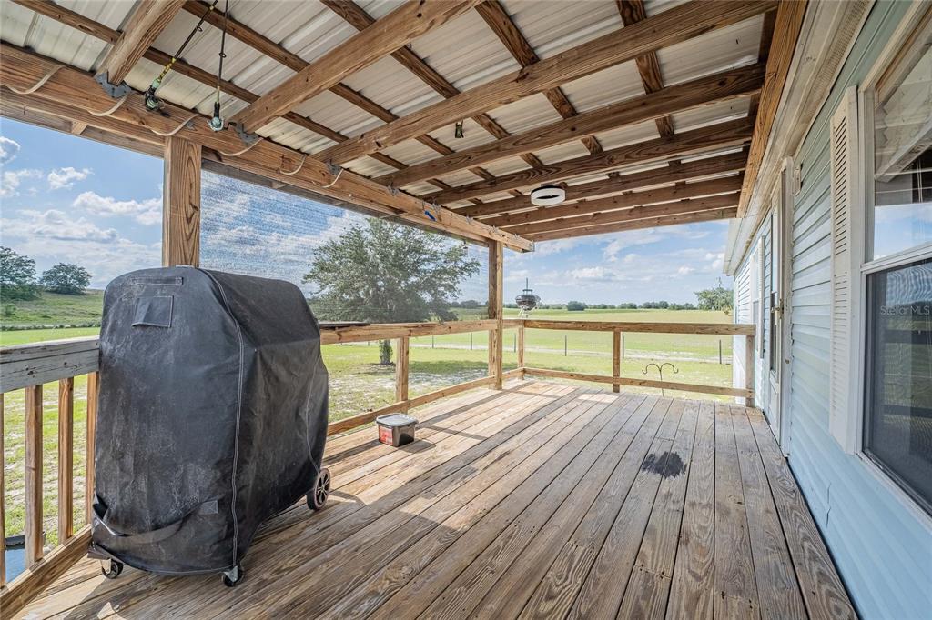 194 North Lake Patrick Road Babson Park, FL 33827 - Photo 5 of 31 a view of balcony with wooden floor