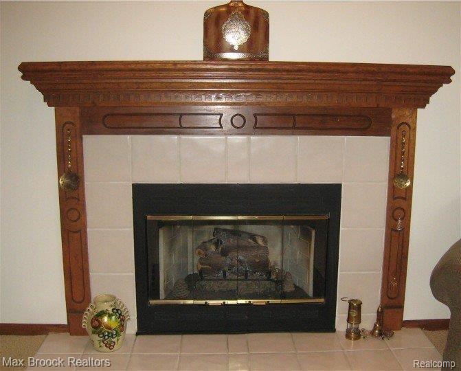 1613 Farnborough Drive Rochester, MI 48307 - Photo 13 of 18 Gas log fireplace in Family Room