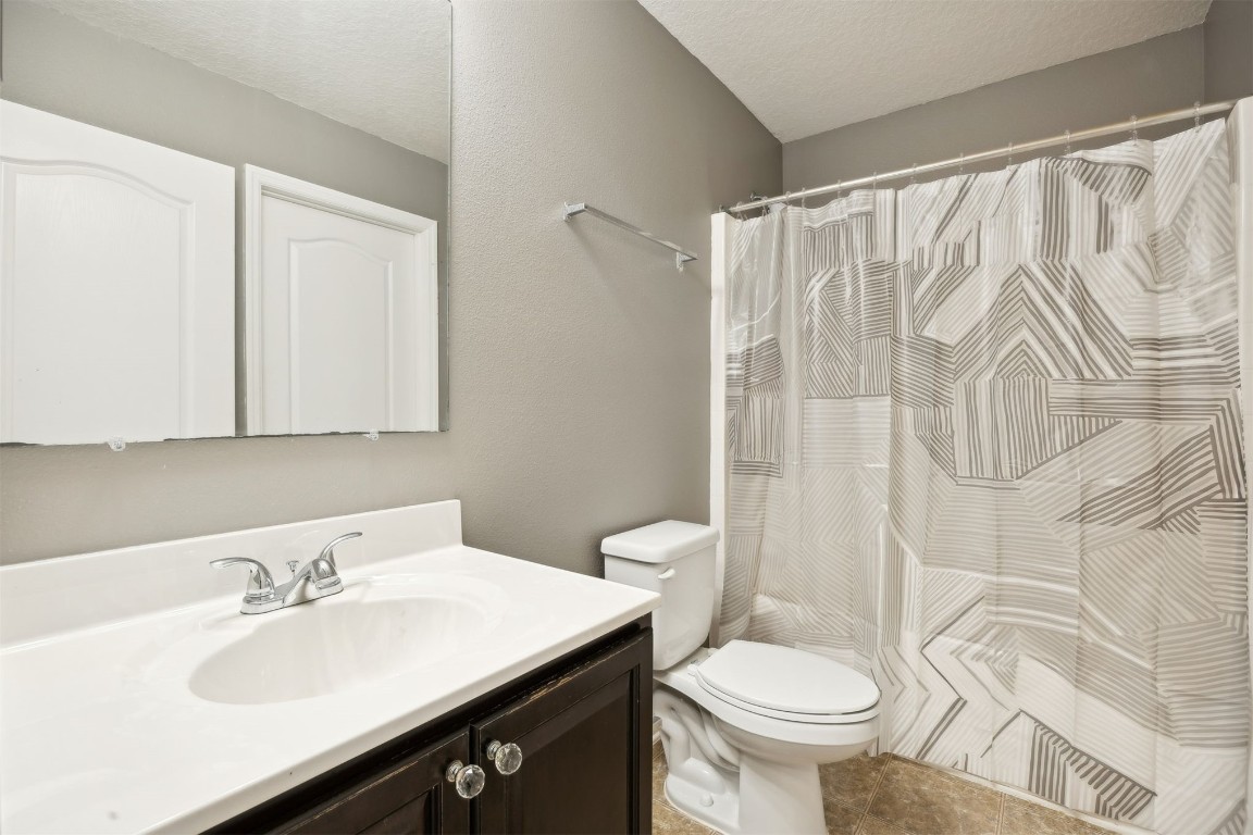 97042 Huntington Court Yulee, FL 32097 - Photo 24 of 54 a bathroom with a sink and a toilet