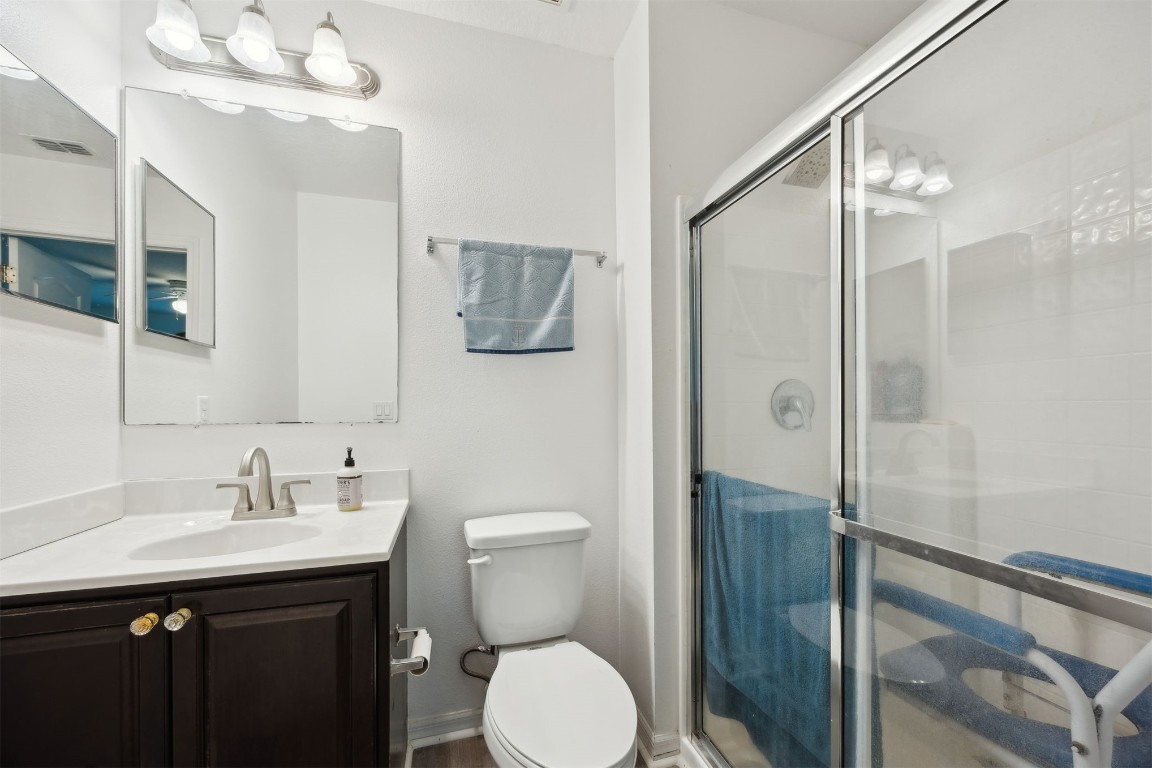 97042 Huntington Court Yulee, FL 32097 - Photo 31 of 54 a bathroom with a sink toilet and shower