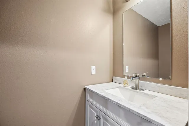 a bathroom with a sink and a toilet