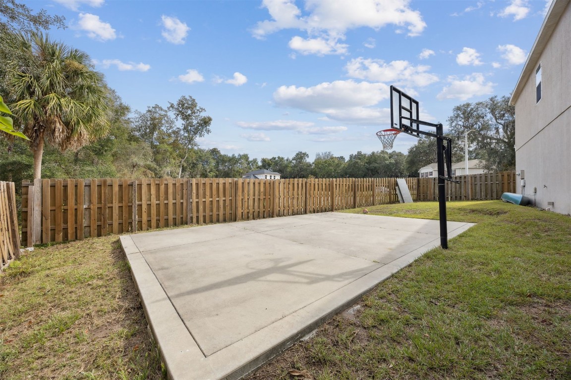 97042 Huntington Court Yulee, FL 32097 - Photo 43 of 54 a view of a backyard