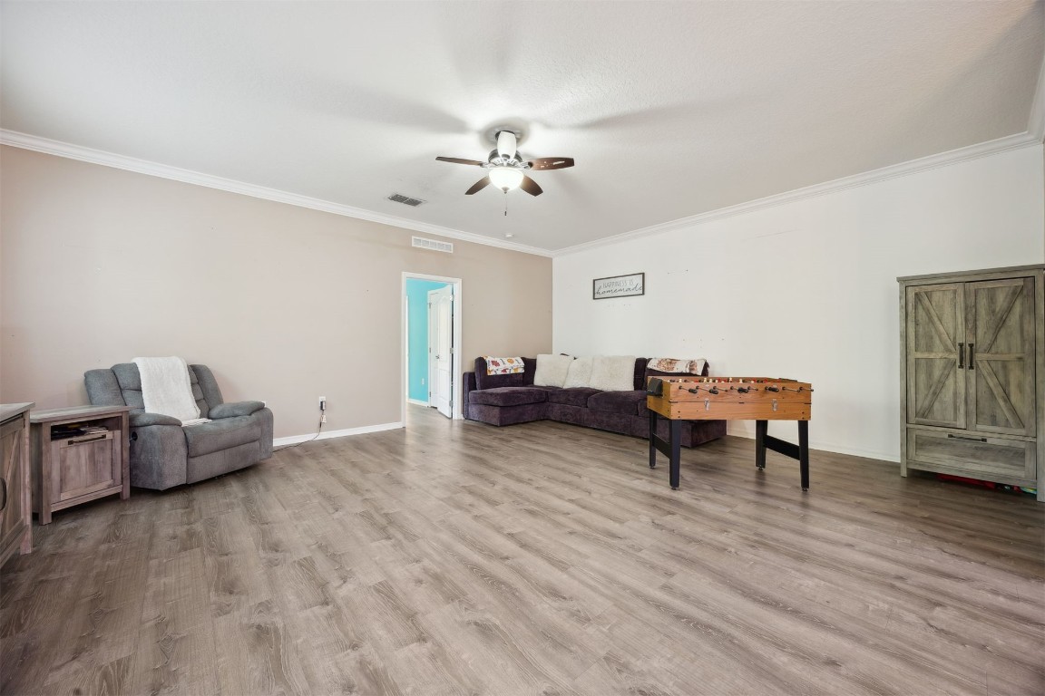 97042 Huntington Court Yulee, FL 32097 - Photo 8 of 54 a living room with furniture and wooden floor