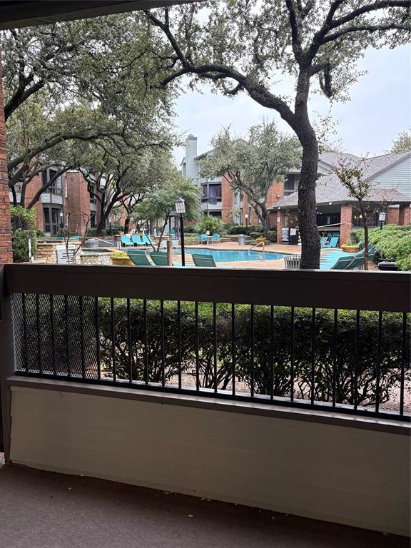 1720 Northeast Green Oaks Boulevard, Unit 104 Arlington, TX 76006 - Photo 12 of 13 a view of swimming pool from a balcony