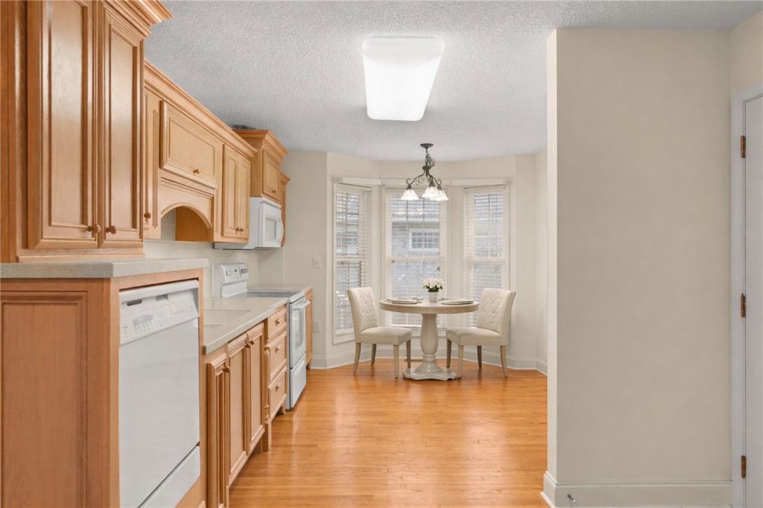 111 Park Way Anderson, SC 29625 - Photo 11 of 19 This spacious kitchen offers ample cabinet space and a bright dining area, perfect for daily meals.