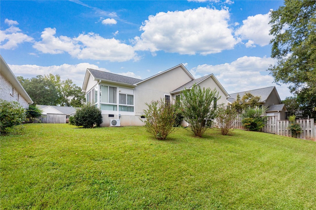 111 Park Way Anderson, SC 29625 - Photo 18 of 19 This residence boasts a spacious lawn, offering ample outdoor enjoyment and serene views.