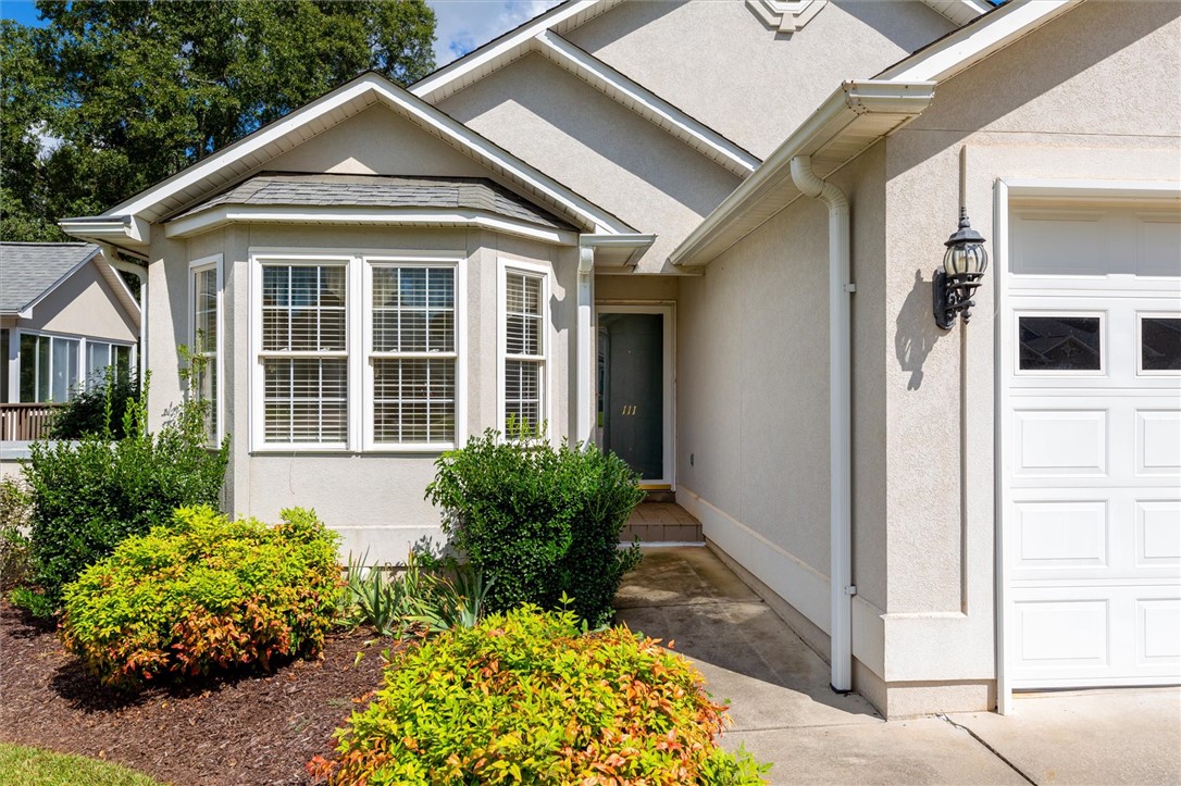 111 Park Way Anderson, SC 29625 - Photo 5 of 19 This charming home offers a welcoming facade with manicured landscaping and a pristine exterior.