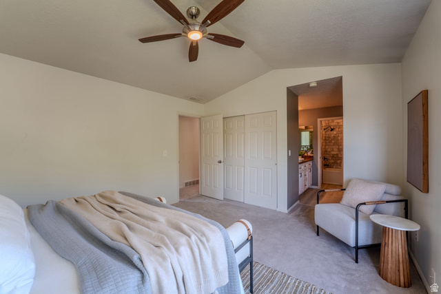 11957 Noelle Road Sandy, UT 84092 - Photo 16 of 38 Vaulted ceiling bedroom featuring carpet flooring, a ceiling fan with light, and sliding closet doors