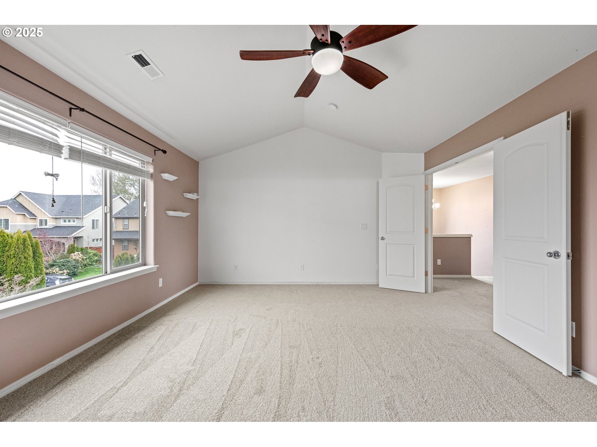 646 Raber Road Eugene, OR 97402 - Photo 27 of 44 a view of an empty room with a window