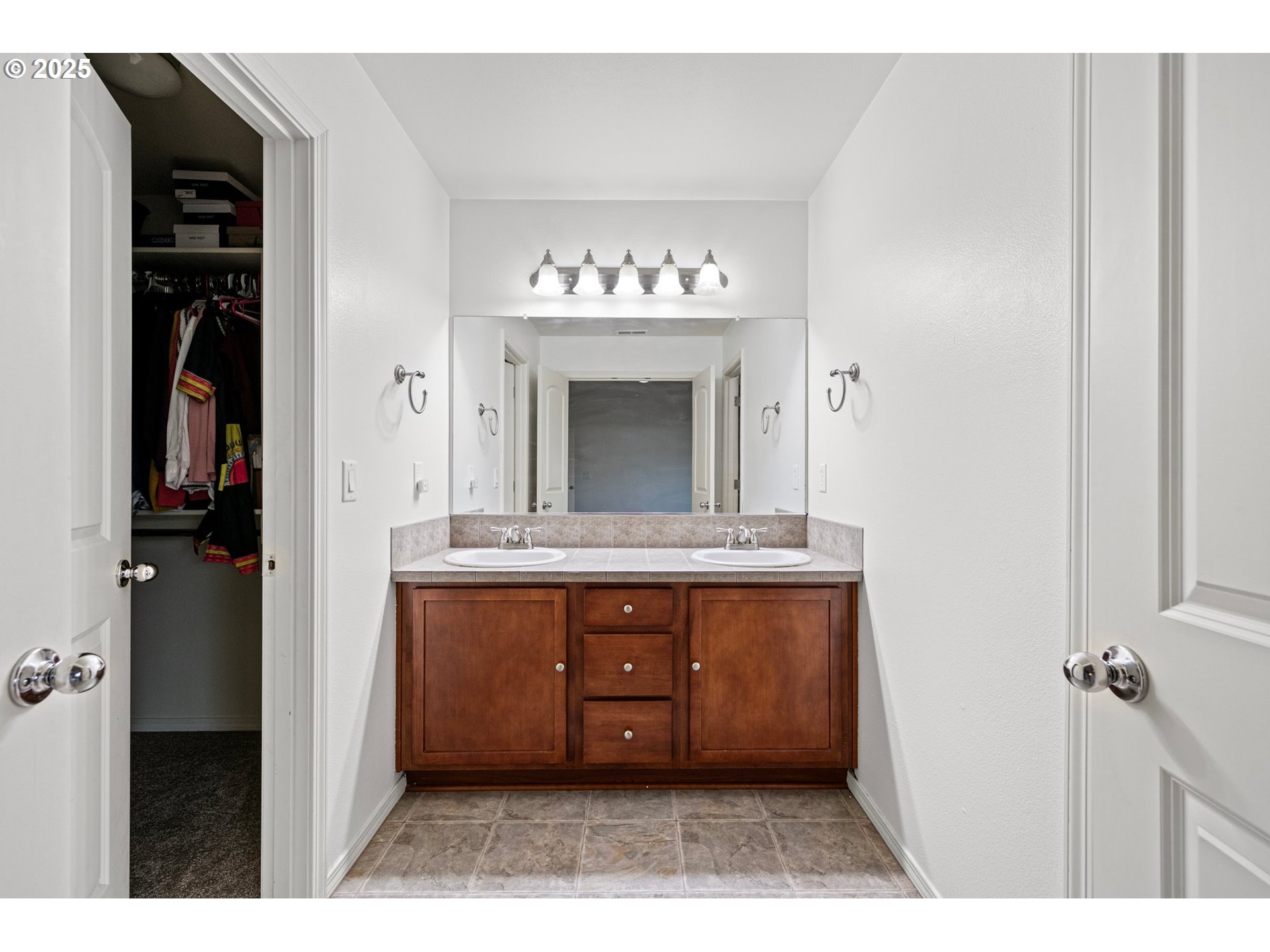 646 Raber Road Eugene, OR 97402 - Photo 28 of 44 a bathroom with a sink and a mirror