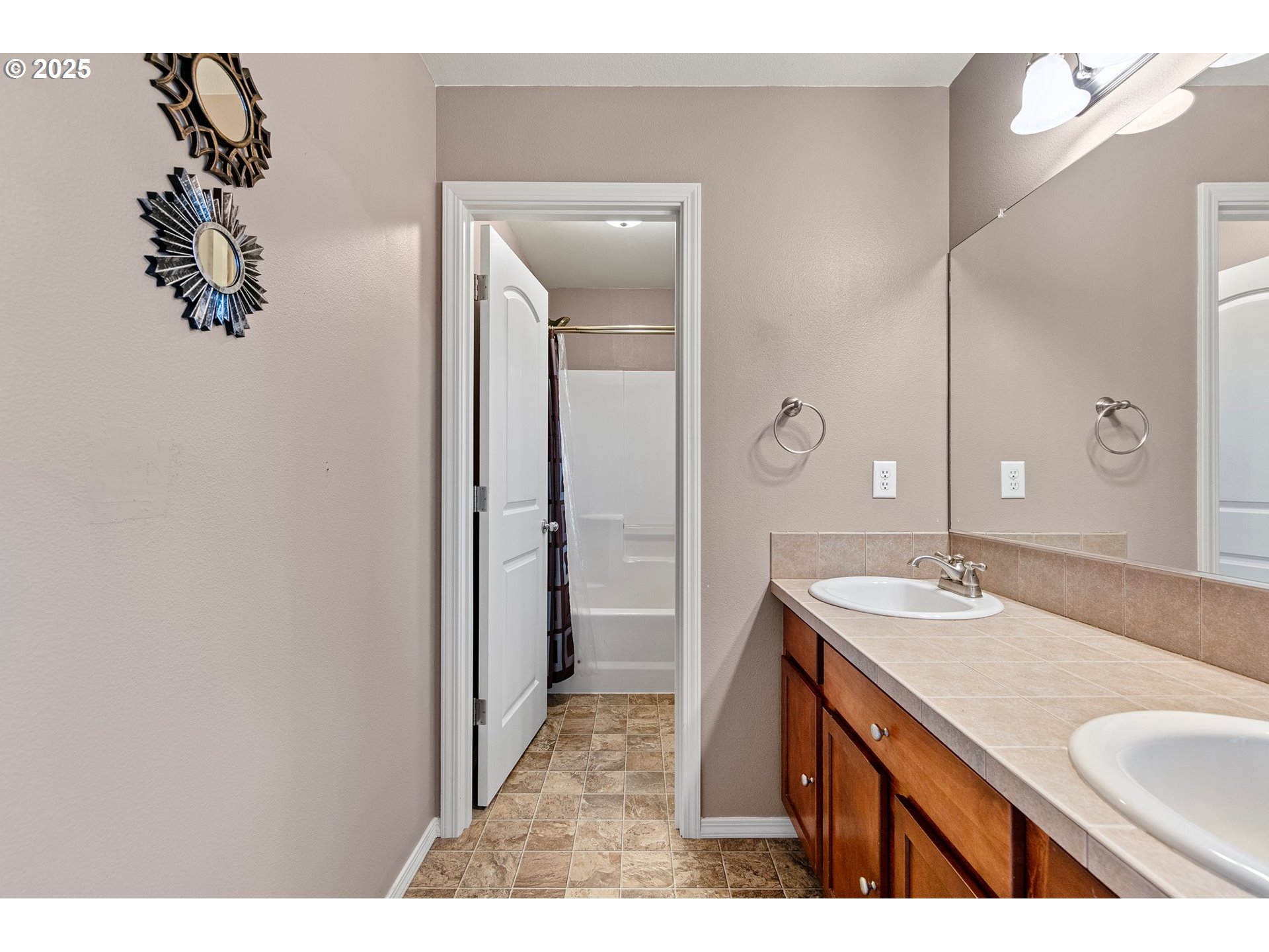 646 Raber Road Eugene, OR 97402 - Photo 34 of 44 a bathroom with a sink and a mirror