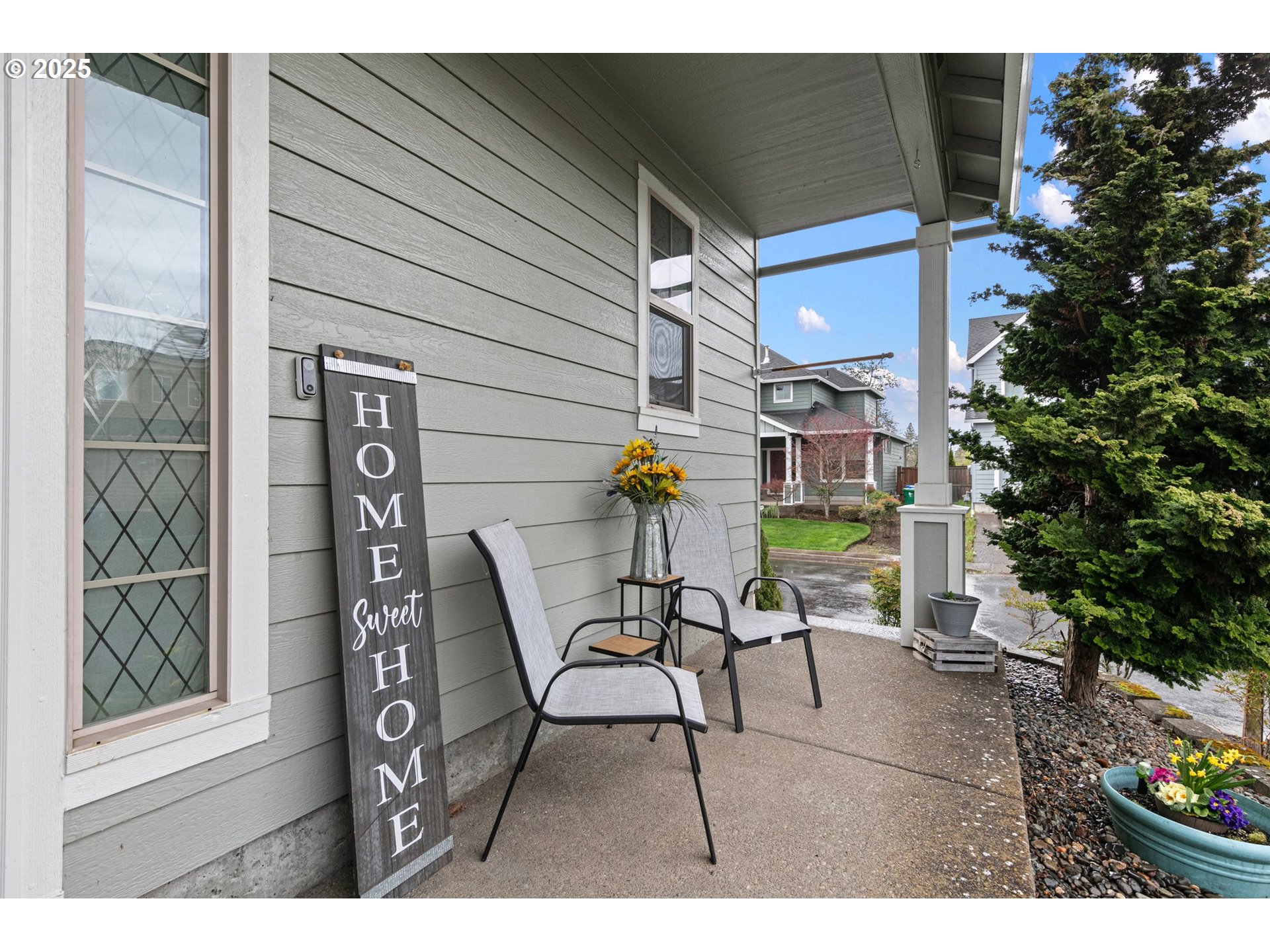 646 Raber Road Eugene, OR 97402 - Photo 4 of 44 a patio with table and chairs and potted plants