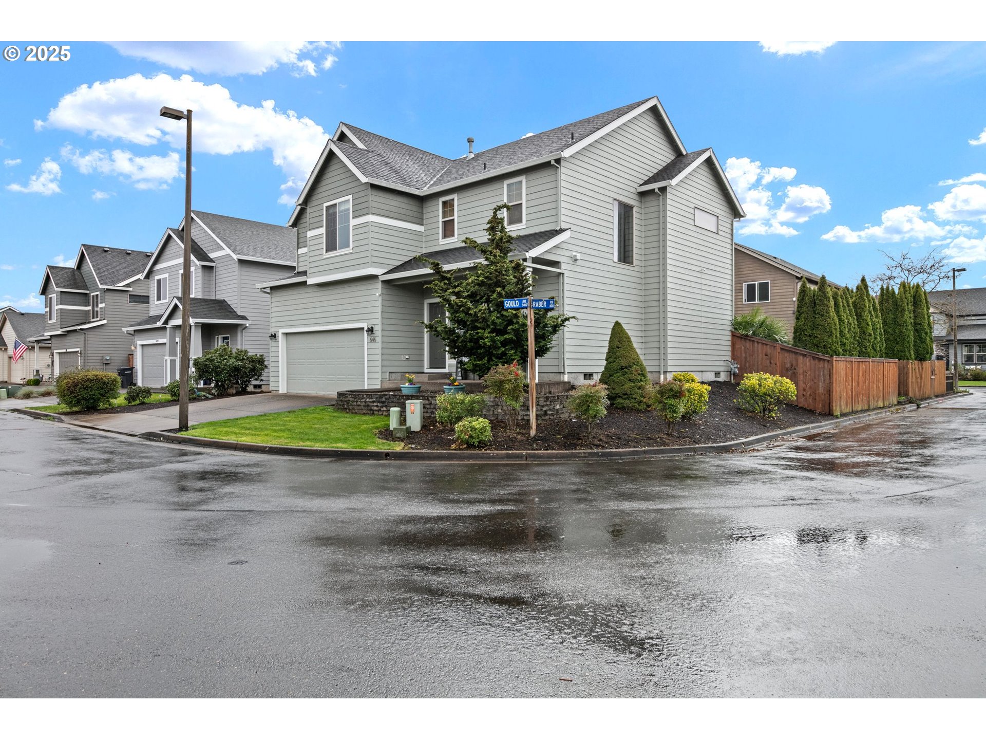 646 Raber Road Eugene, OR 97402 - Photo 43 of 44 a view of a house with a small yard and sitting area
