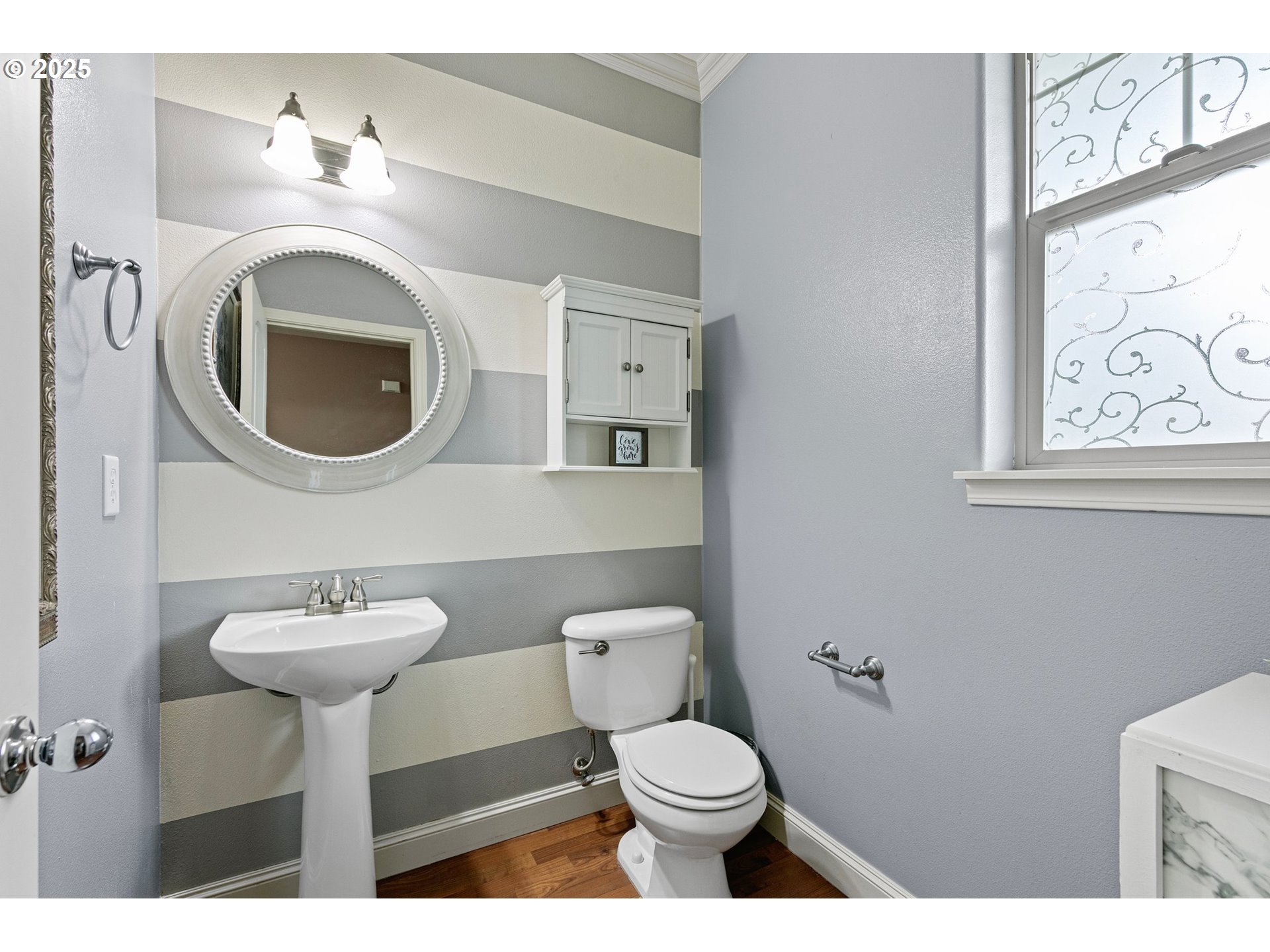 646 Raber Road Eugene, OR 97402 - Photo 7 of 44 a bathroom with a toilet sink and mirror