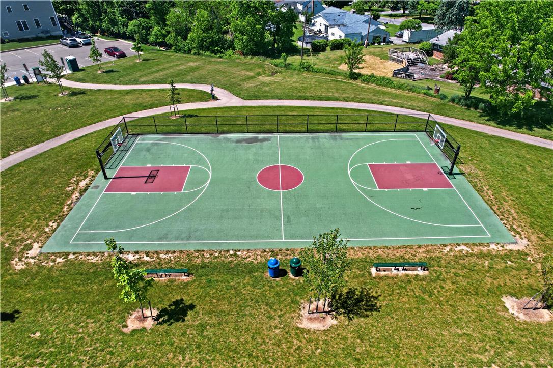 4502 Benjamin Court Emmaus, PA 18049 - Photo 47 of 48 An aerial view captures the vibrant outdoor basketball court, ready for play amidst verdant landscaping.