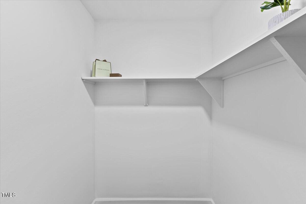 217 Brandon Court Raleigh, NC 27609 - Photo 16 of 30 a close up of a white cabinet
