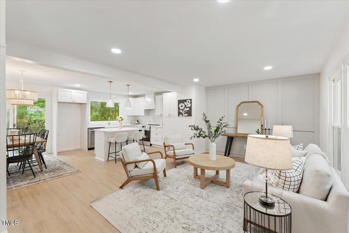 217 Brandon Court Raleigh, NC 27609 - Photo 6 of 30 a living room with furniture and a table