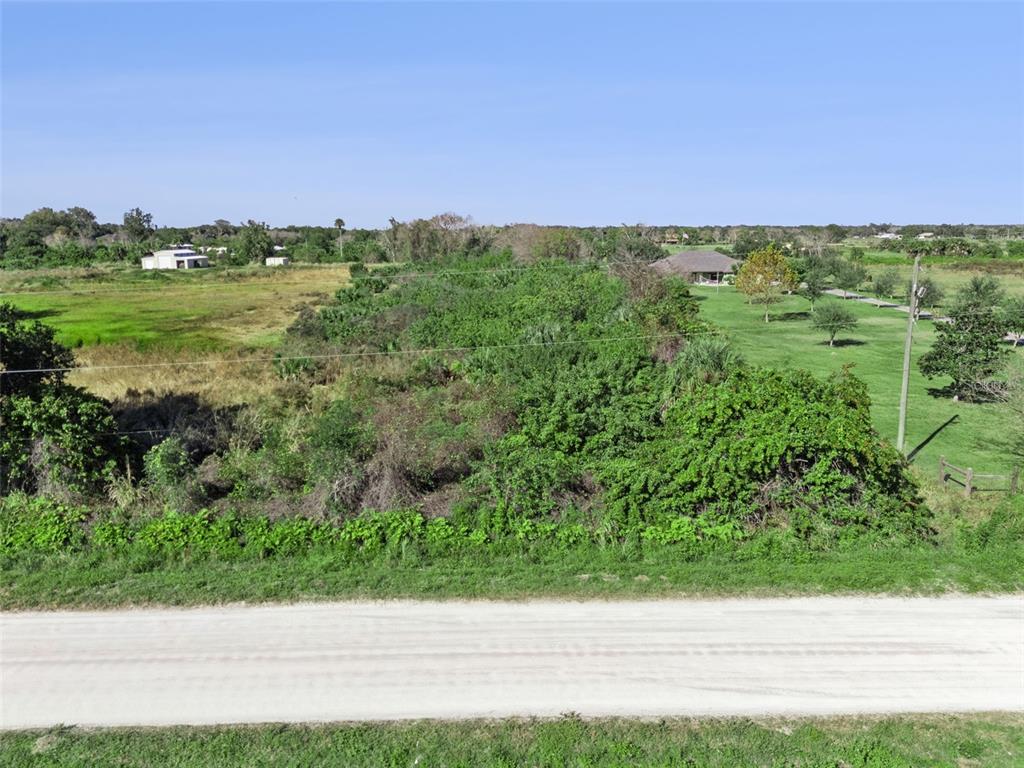 0 Huntington Avenue Mims, FL 32754 - Photo 12 of 21 a view of a field with an outdoor space