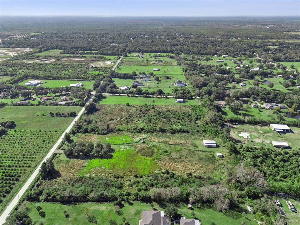 0 Huntington Avenue Mims, FL 32754 - Photo 3 of 21 a view of a green field with lots of green space