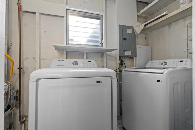 a utility room with dryer and washer