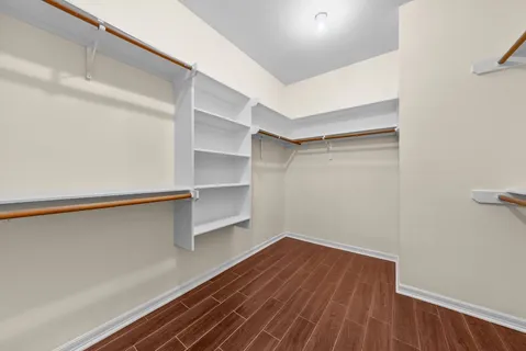 a view of an empty walk in closet