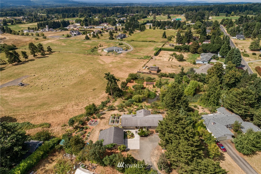 283 Williamson Road Sequim, WA 98382 - Photo 22 of 38 an aerial view of residential houses with outdoor space