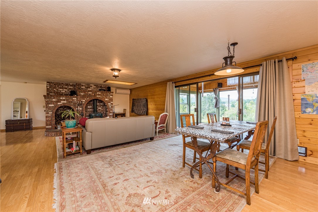 283 Williamson Road Sequim, WA 98382 - Photo 4 of 38 a view of a dining room with furniture window and outside view